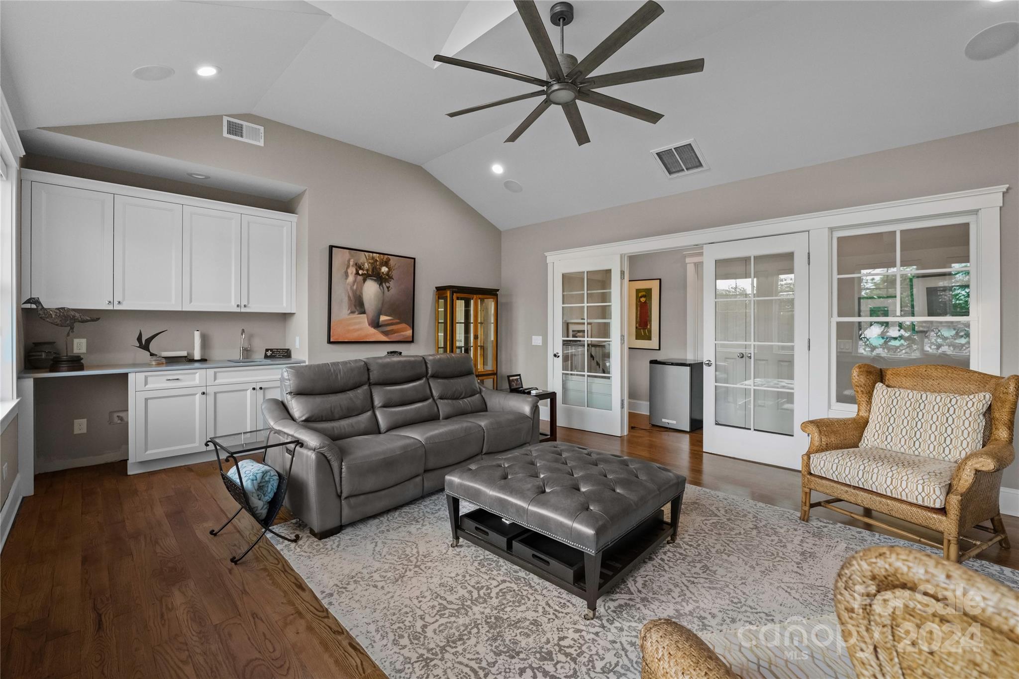 18121 John Connor Road Cornelius, NC 28031 - Photo 23 of 43 a living room with furniture and a large window
