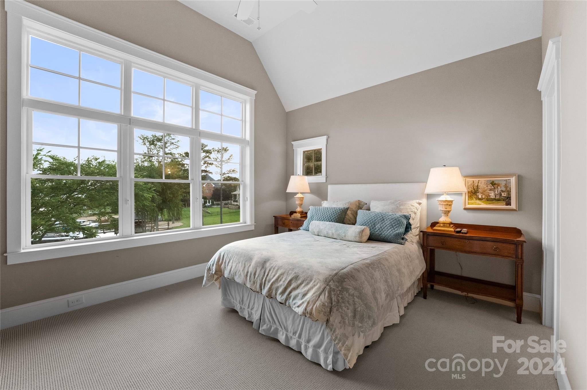 18121 John Connor Road Cornelius, NC 28031 - Photo 27 of 43 a bedroom with a bed and a large window