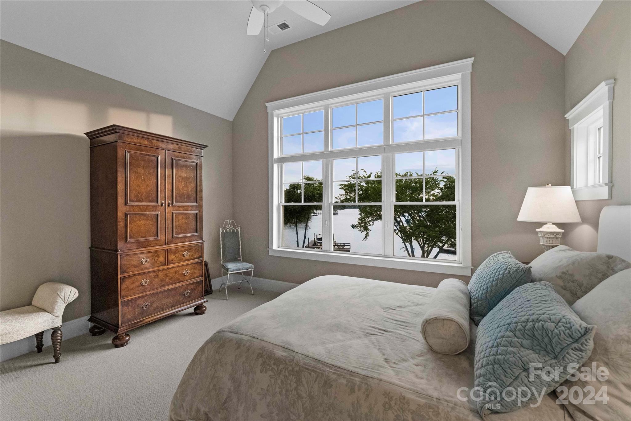18121 John Connor Road Cornelius, NC 28031 - Photo 29 of 43 a bedroom with a bed and with a large window