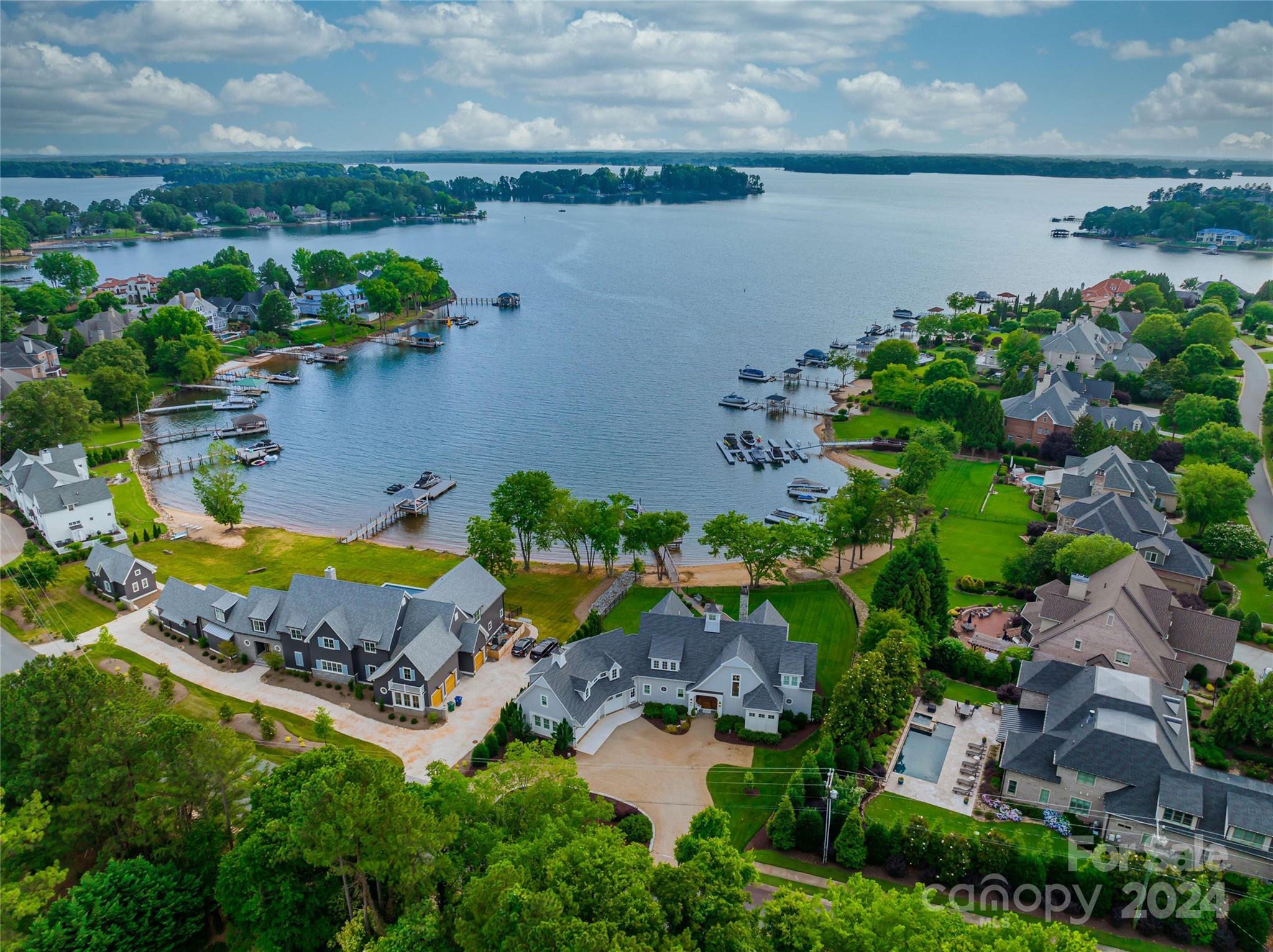 18121 John Connor Road Cornelius, NC 28031 - Photo 42 of 43 an aerial view of a house with a lake view