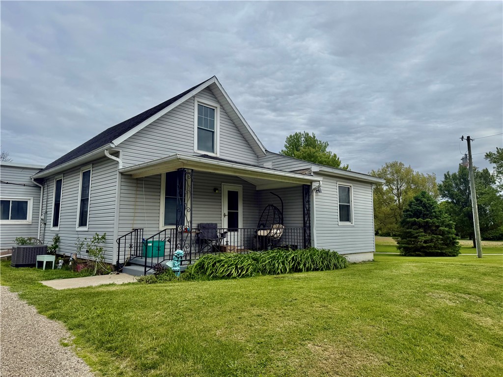 3032 West State Rte 29 Urbana, OH 43078 - Photo 1 of 3 This charming home features classic siding and a welcoming porch, ready for your personal touch.