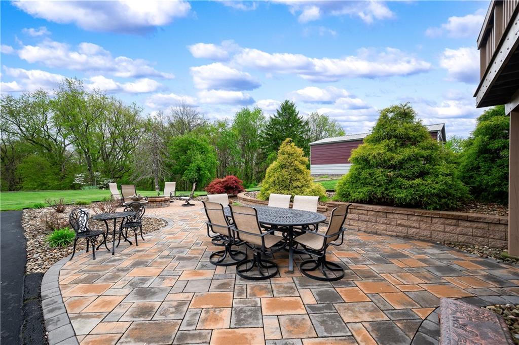 829 Hartzell School Road New Brighton, PA 15066 - Photo 36 of 50 a view of a backyard with sitting area