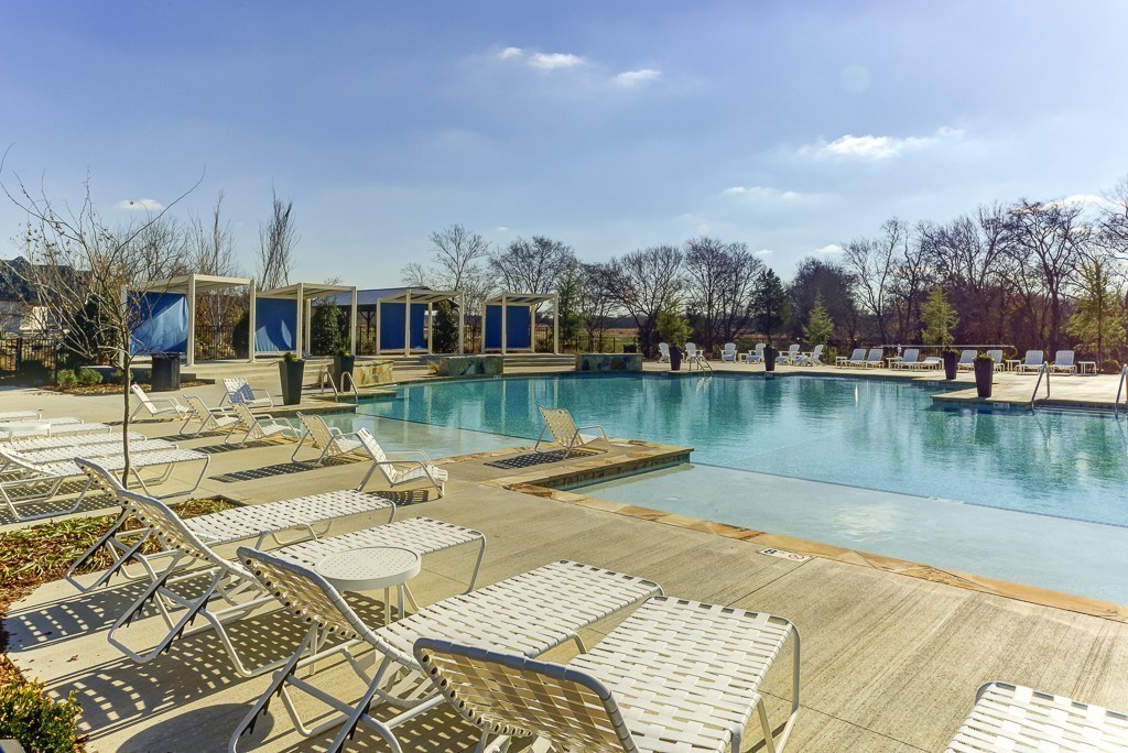 320 Huron Drive Thompson's Station, TN 37179 - Photo 11 of 16 a view of a lake with a house swimming pool and outdoor space