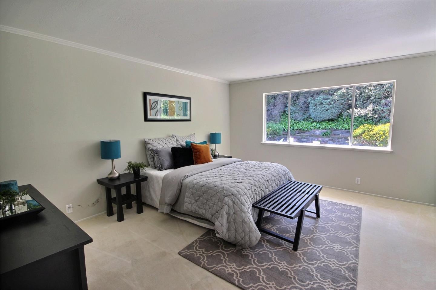 1817 Hunt Drive Burlingame, CA 94010 - Photo 13 of 20 a bedroom with a bed and a window