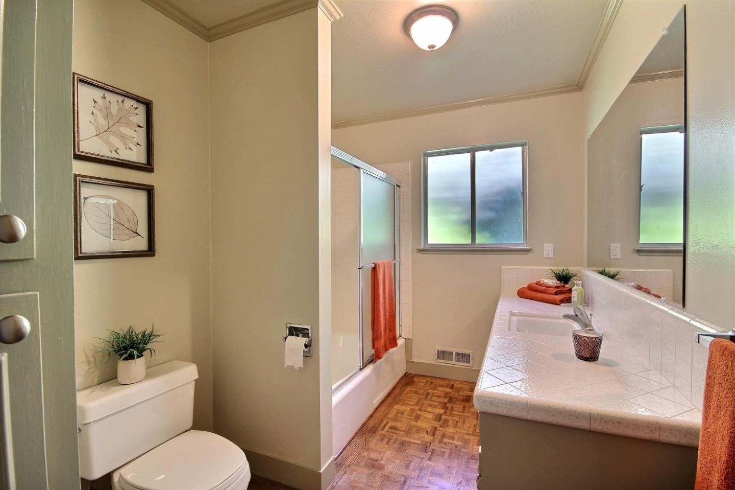 1817 Hunt Drive Burlingame, CA 94010 - Photo 16 of 20 a bathroom with a sink toilet and shower