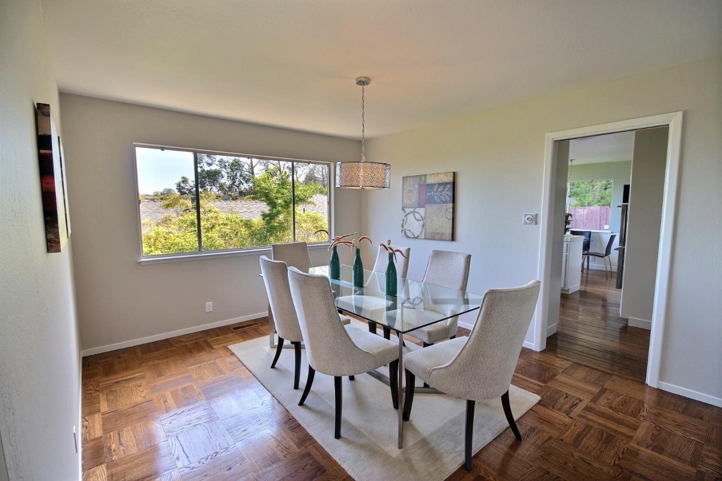 1817 Hunt Drive Burlingame, CA 94010 - Photo 6 of 20 a view of a dining room with furniture window and outside view
