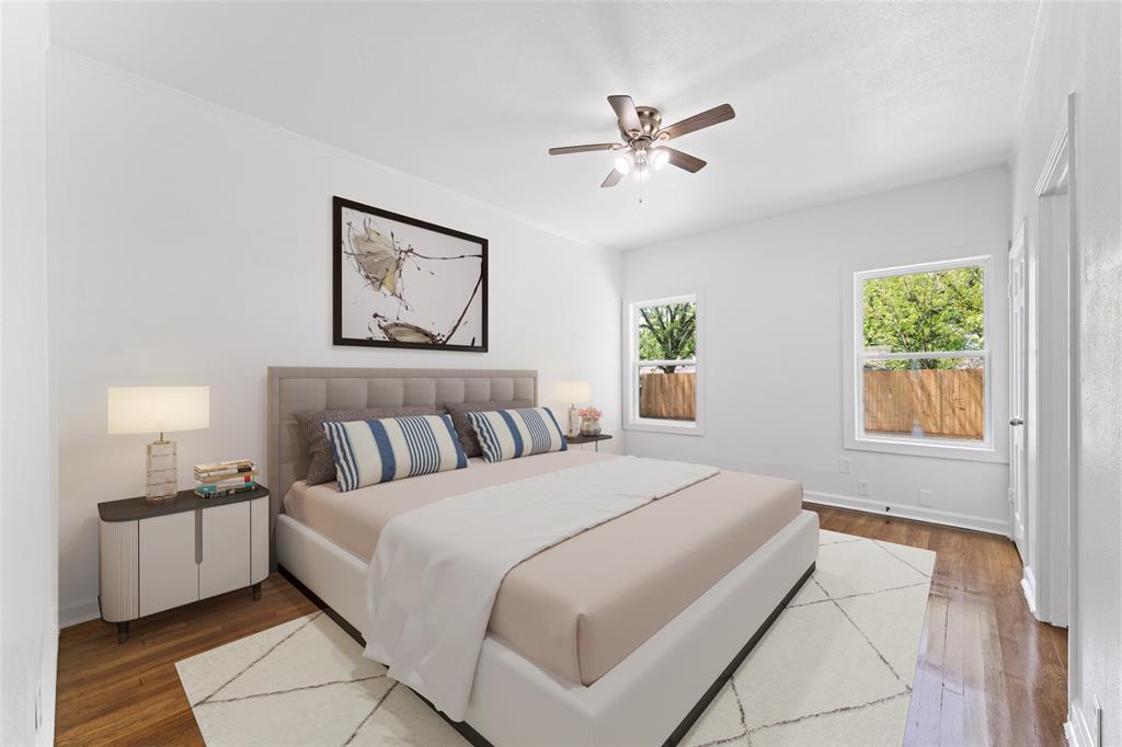 2405 Monroe Street Commerce, TX 75428 - Photo 15 of 31 a bedroom with a large bed and a window