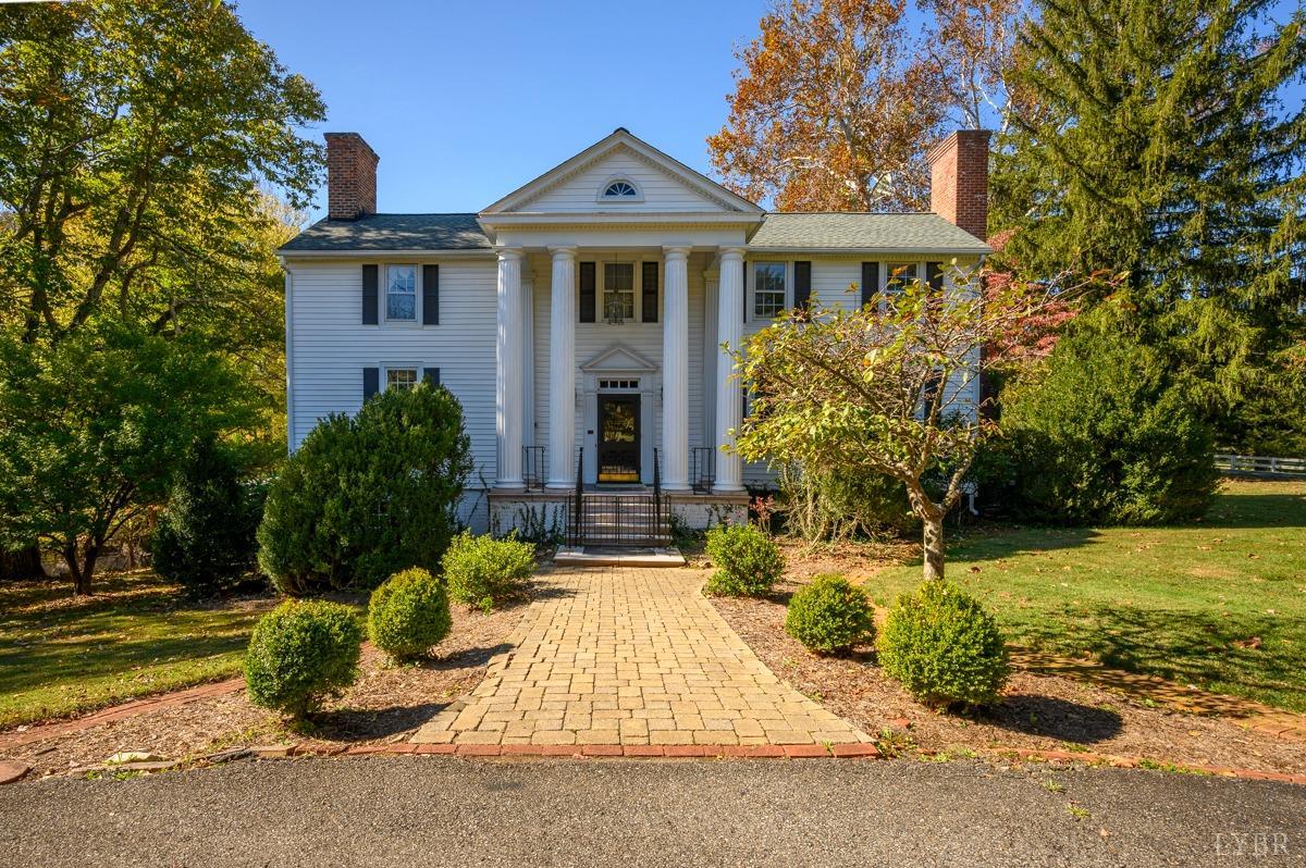 2812 Link Road Lynchburg, VA 24503 - Photo 1 of 65 a view of a house with a yard and plants