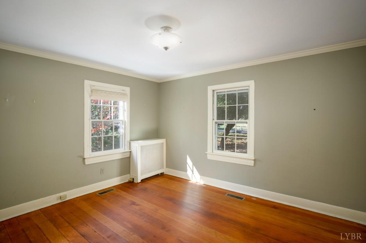 2812 Link Road Lynchburg, VA 24503 - Photo 18 of 65 a view of an empty room with a window and wooden floor