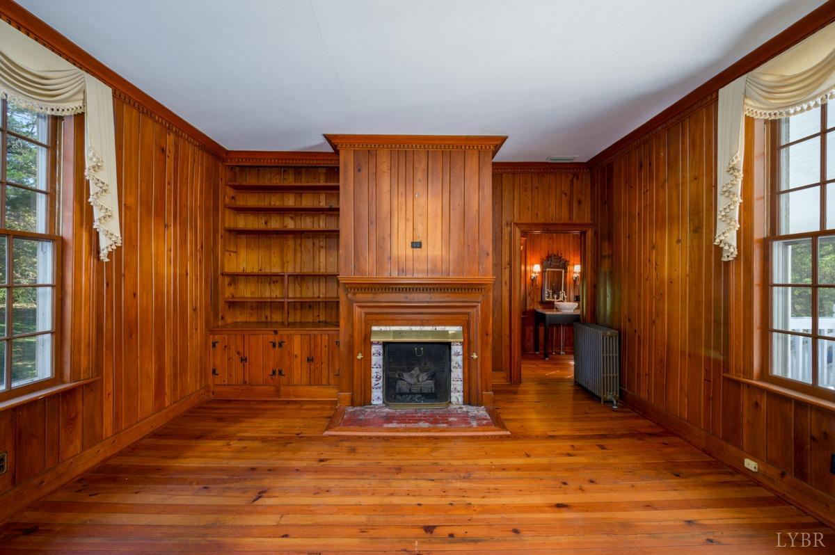 2812 Link Road Lynchburg, VA 24503 - Photo 22 of 65 a view of a livingroom with wooden floor and a fireplace
