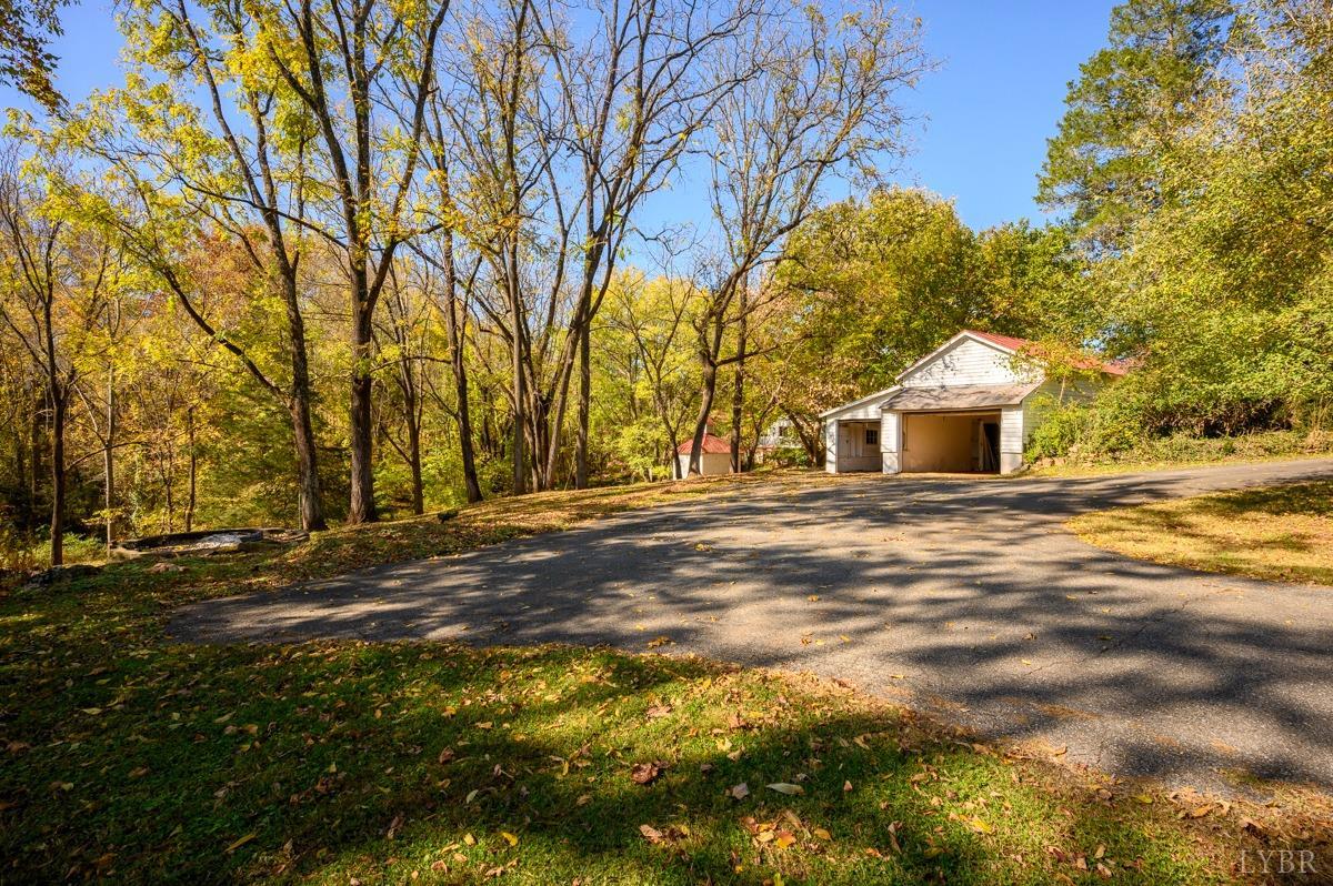 2812 Link Road Lynchburg, VA 24503 - Photo 52 of 65 a front view of a house with a yard and garage