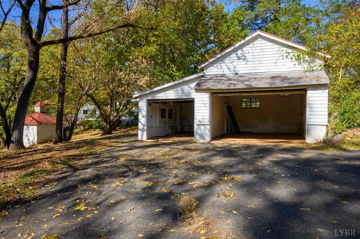 2812 Link Road Lynchburg, VA 24503 - Photo 53 of 65 a front view of a house with a yard and garage