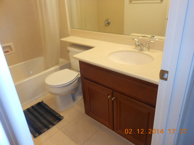 7542 Stoneleaf Road San Ramon, CA 94582 - Photo 12 of 24 a bathroom with a sink and a mirror