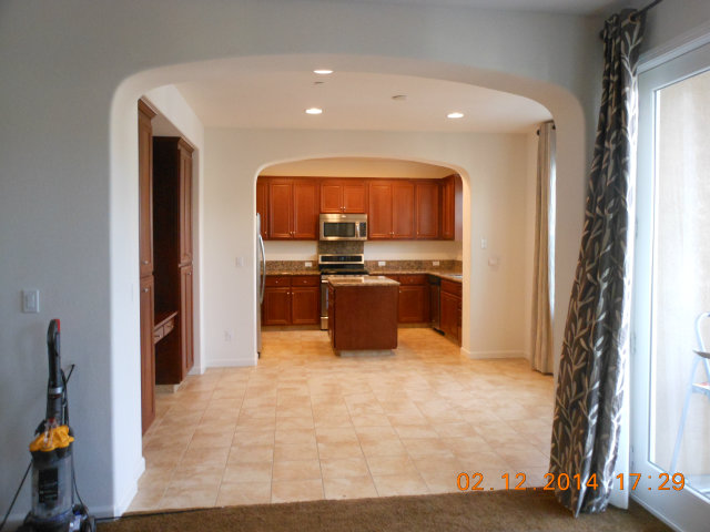 7542 Stoneleaf Road San Ramon, CA 94582 - Photo 18 of 24 a kitchen with stainless steel appliances granite countertop a refrigerator and a sink