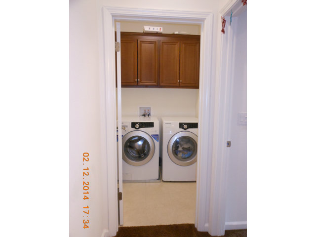 7542 Stoneleaf Road San Ramon, CA 94582 - Photo 9 of 24 a utility room with dryer and washer