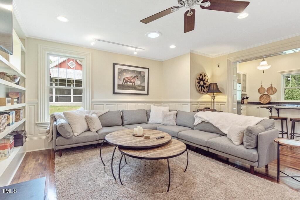 5612 Cabe Ford Road Durham, NC 27705 - Photo 12 of 42 a living room with furniture and a large window
