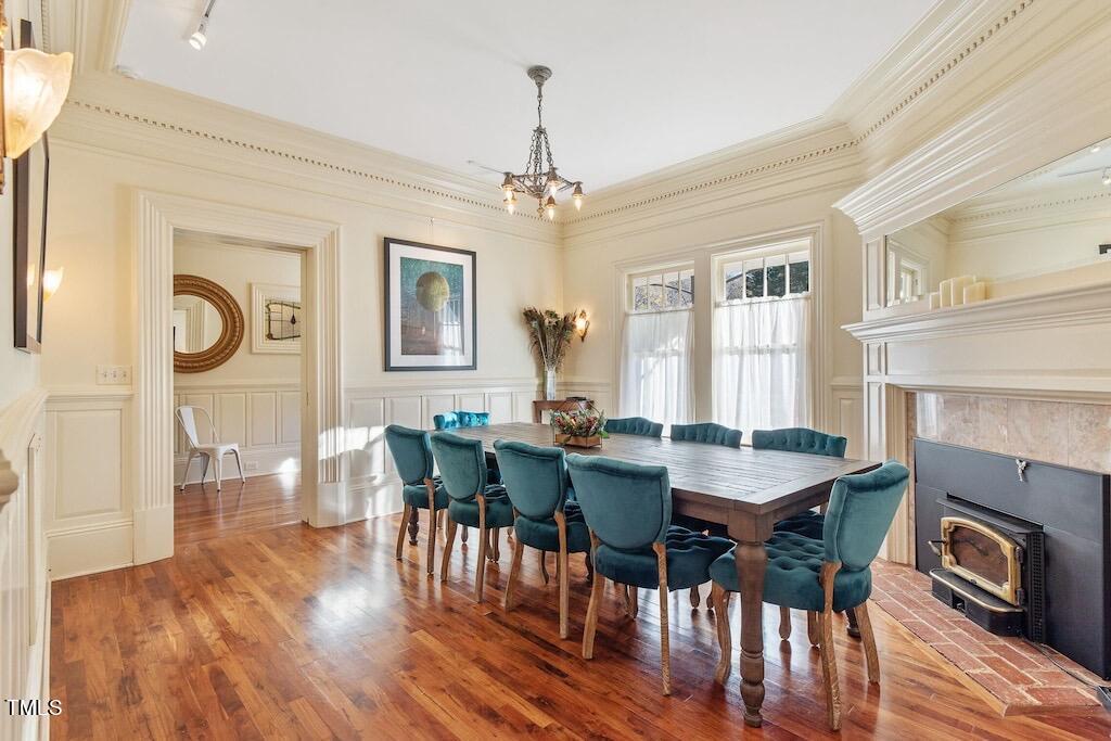 5612 Cabe Ford Road Durham, NC 27705 - Photo 13 of 42 a view of a dining room with furniture window and wooden floor