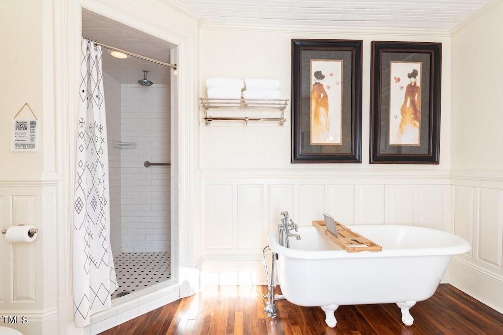 5612 Cabe Ford Road Durham, NC 27705 - Photo 18 of 42 a bathroom with a sink mirror and a bathtub