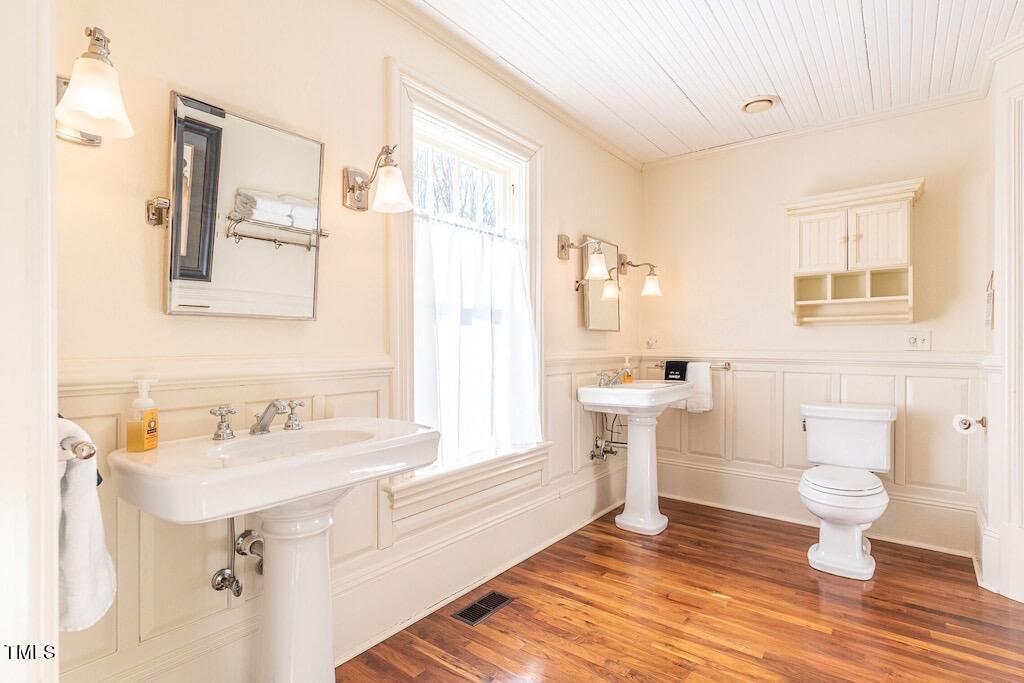5612 Cabe Ford Road Durham, NC 27705 - Photo 19 of 42 a bathroom with a sink toilet and shower
