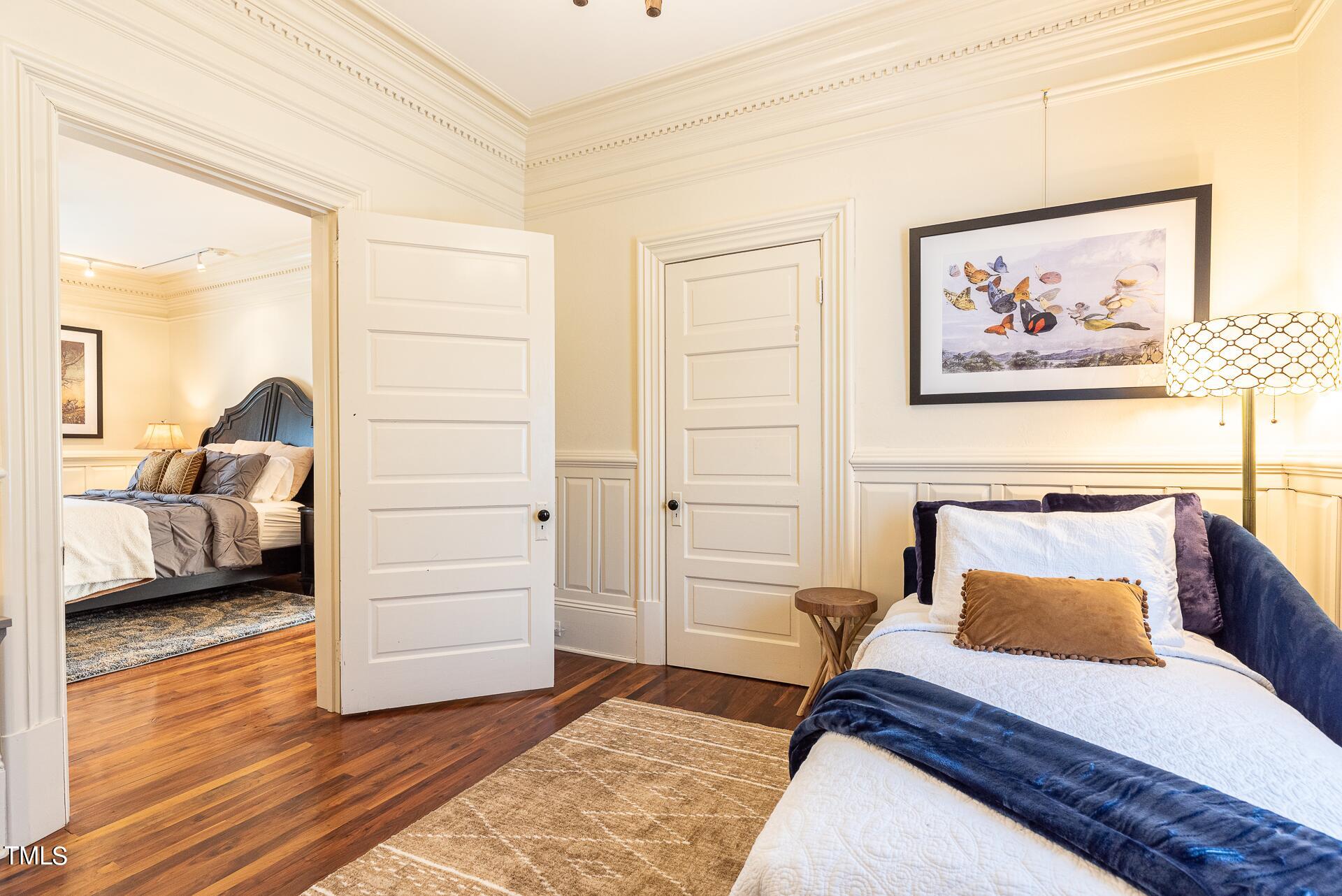 5612 Cabe Ford Road Durham, NC 27705 - Photo 21 of 42 a bedroom with a bed and a couch