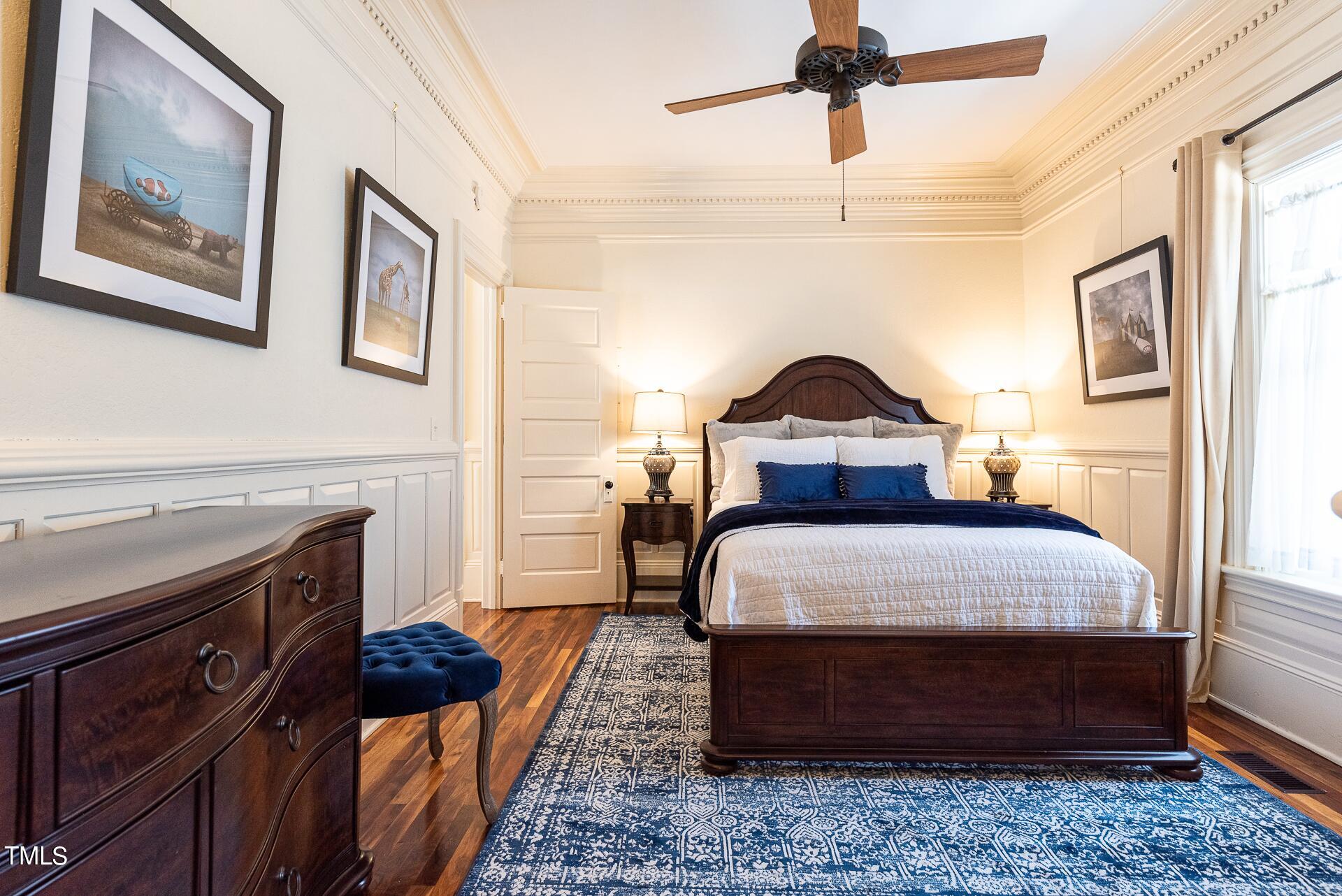 5612 Cabe Ford Road Durham, NC 27705 - Photo 24 of 42 a bedroom with bed and wooden floor