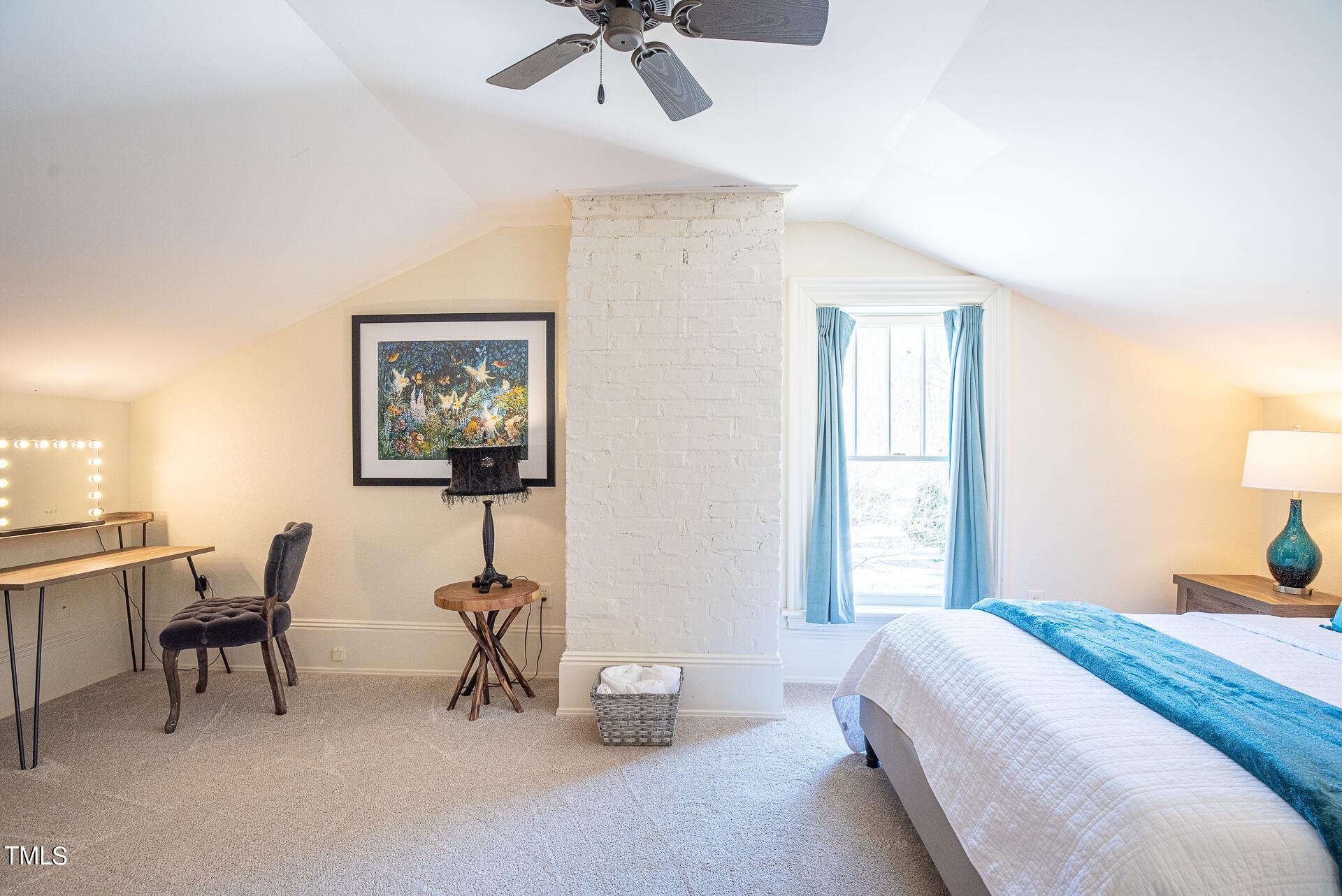 5612 Cabe Ford Road Durham, NC 27705 - Photo 29 of 42 a bedroom with furniture and a window