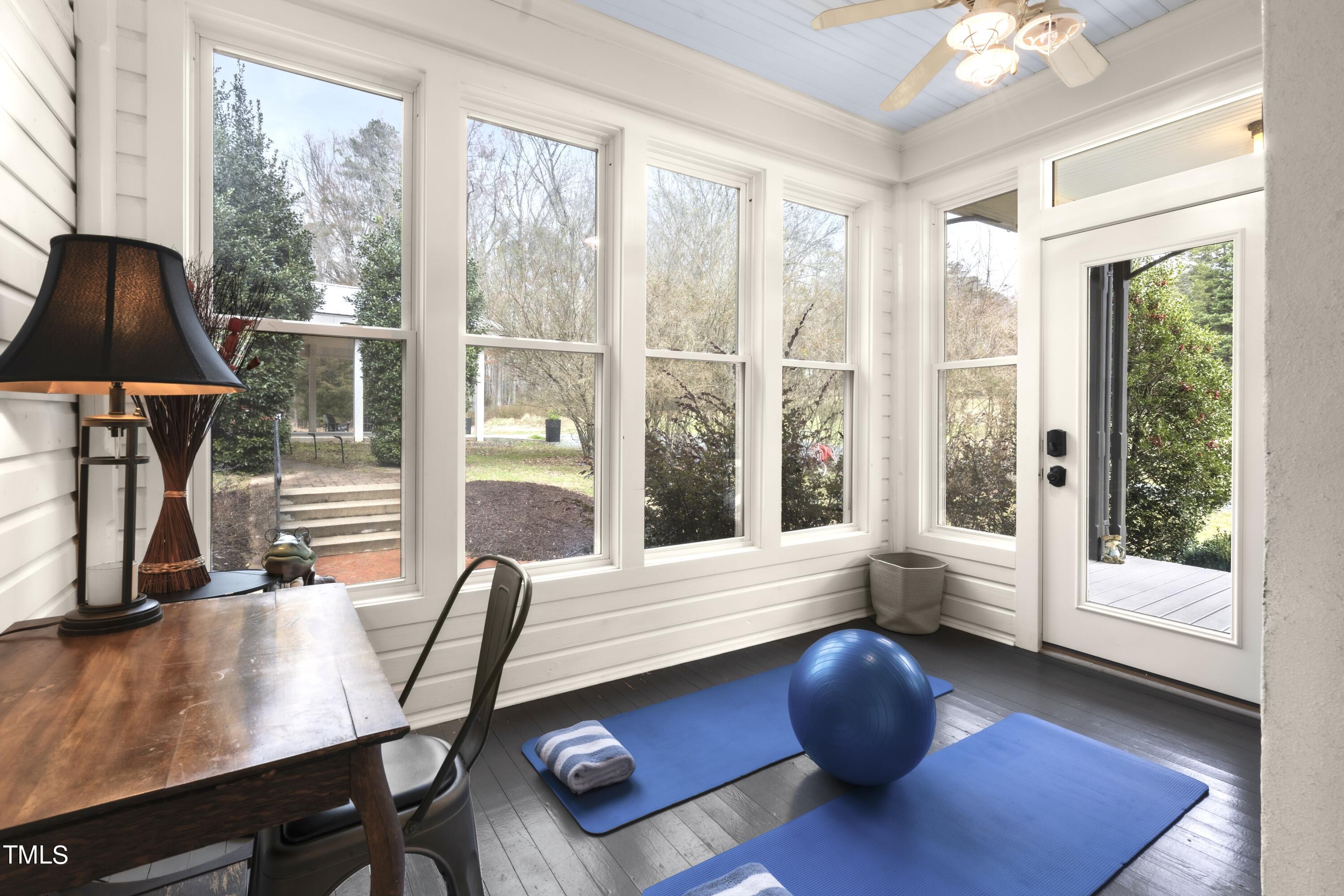 5612 Cabe Ford Road Durham, NC 27705 - Photo 33 of 42 a living room with furniture and a large window