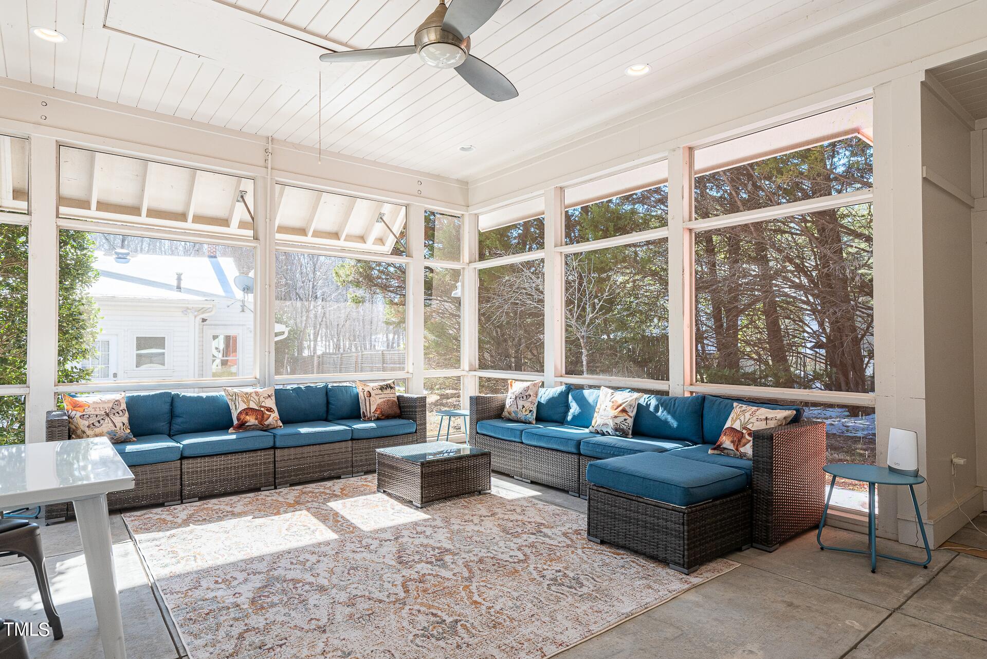 5612 Cabe Ford Road Durham, NC 27705 - Photo 35 of 42 a living room with furniture and a large window