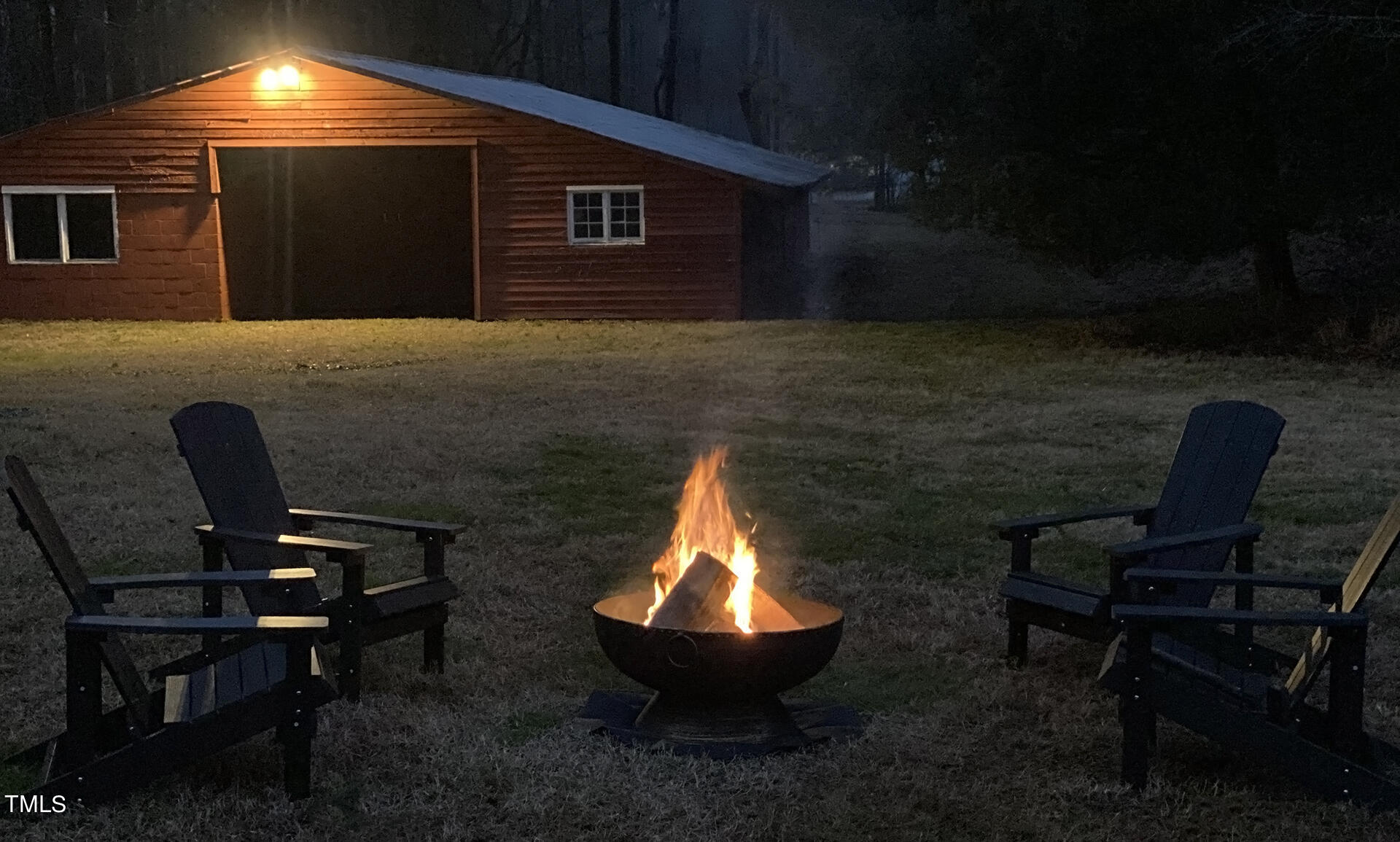 5612 Cabe Ford Road Durham, NC 27705 - Photo 39 of 42 a balcony with chairs and a potted plant