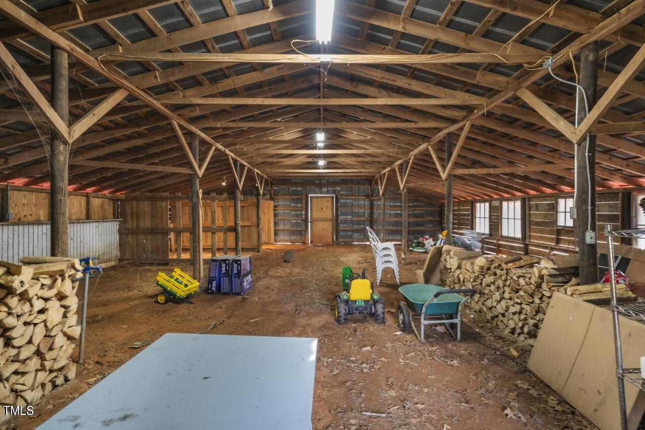5612 Cabe Ford Road Durham, NC 27705 - Photo 40 of 42 a view of a room with table and chairs