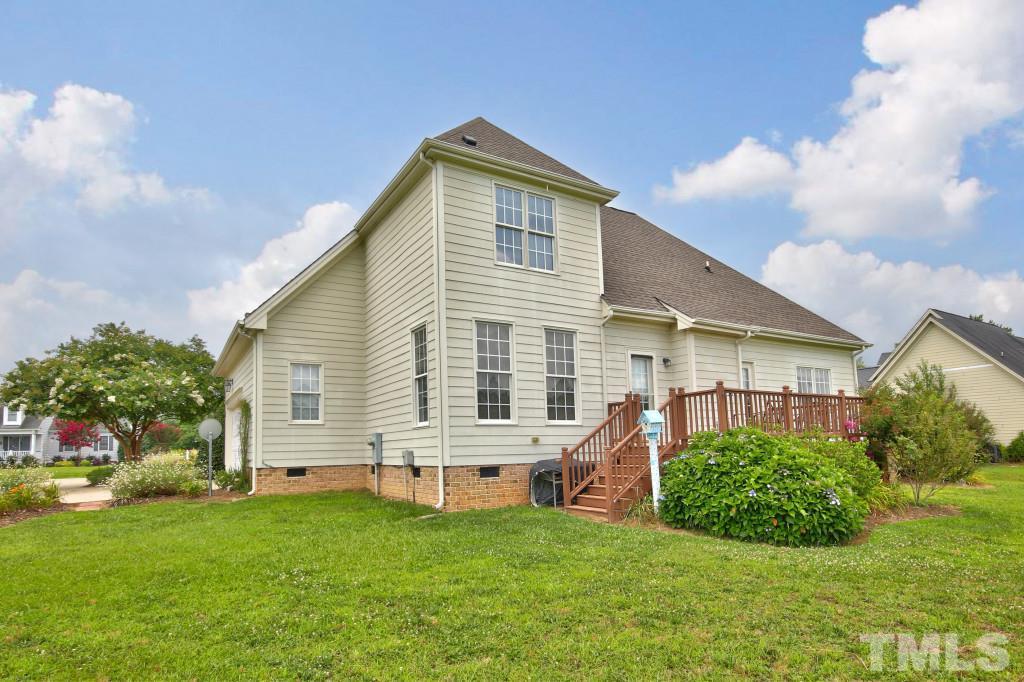 1012 Pasture View Lane Raleigh, NC 27603 - Photo 22 of 25 a front view of a house with a yard