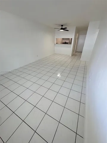 a view of a refrigerator and window