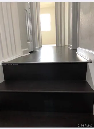 a view of table and chair in a room