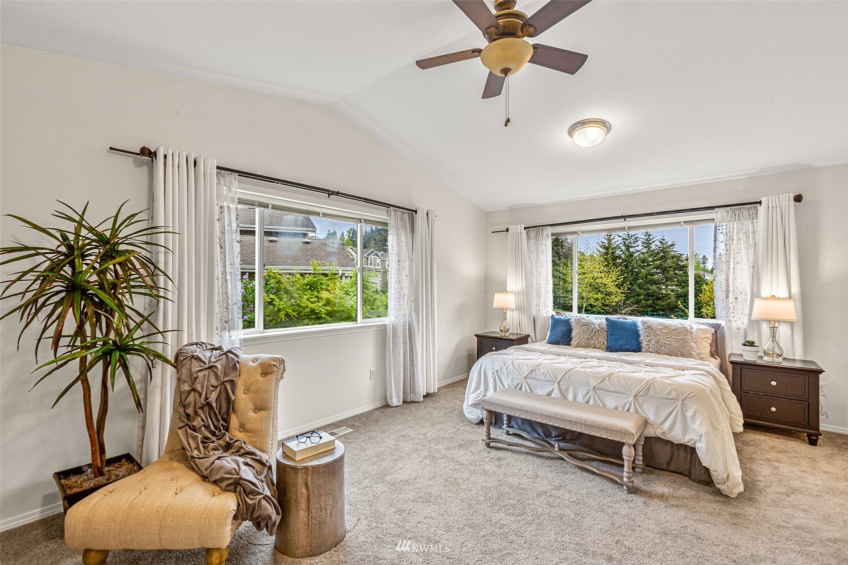 23904 17th Avenue West Bothell, WA 98021 - Photo 20 of 34 a bedroom with a bed and a large window