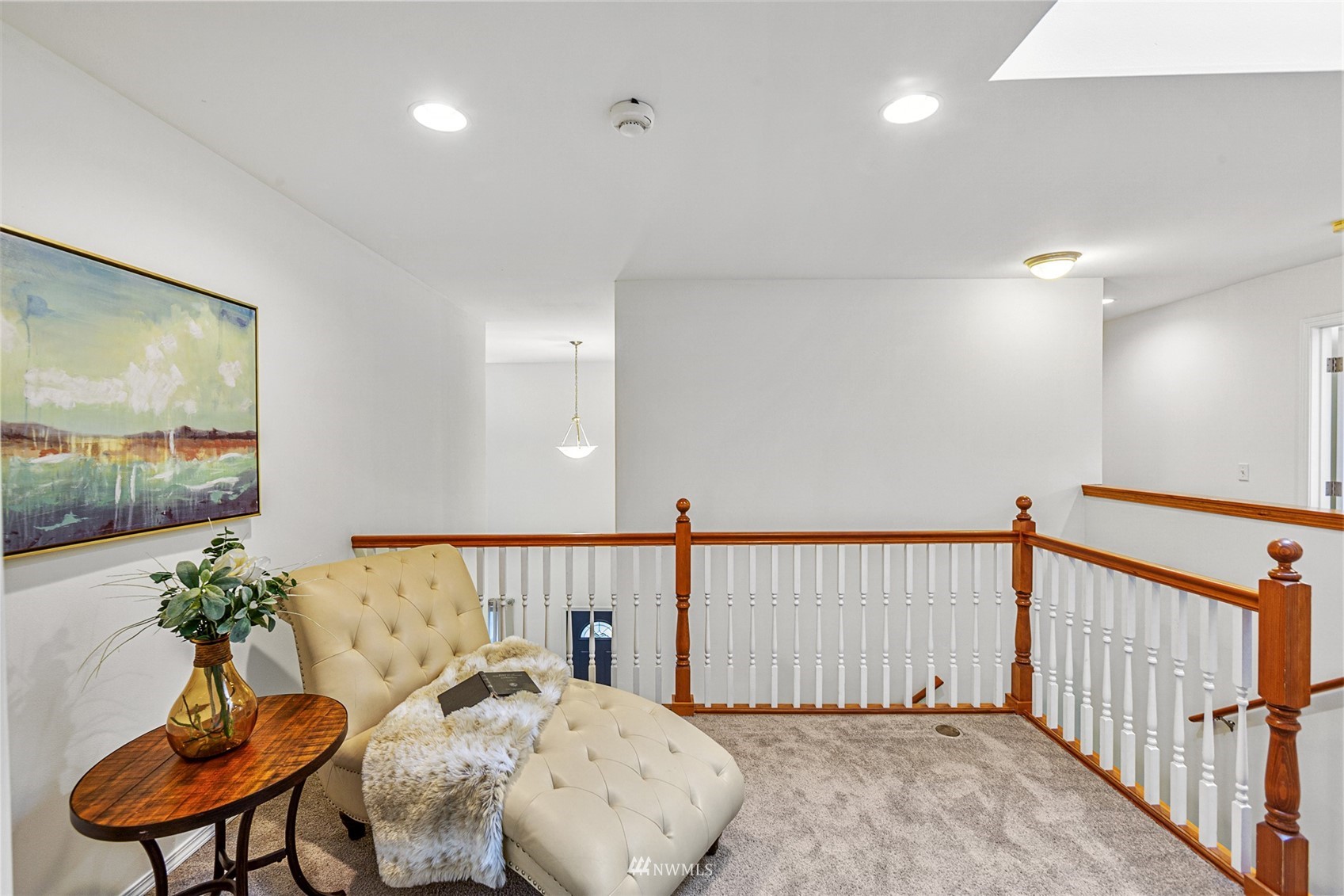 23904 17th Avenue West Bothell, WA 98021 - Photo 24 of 34 a view of a hallway and a livingroom with furniture