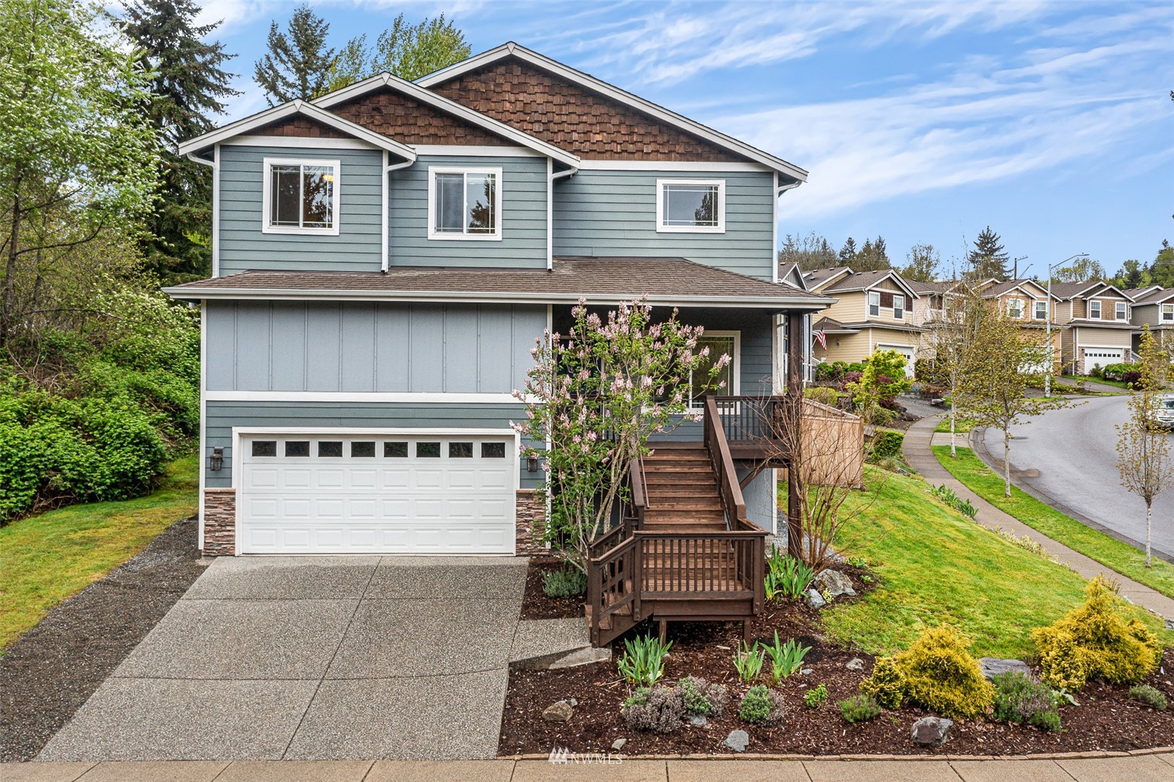 23904 17th Avenue West Bothell, WA 98021 - Photo 32 of 34 a front view of a house with a yard