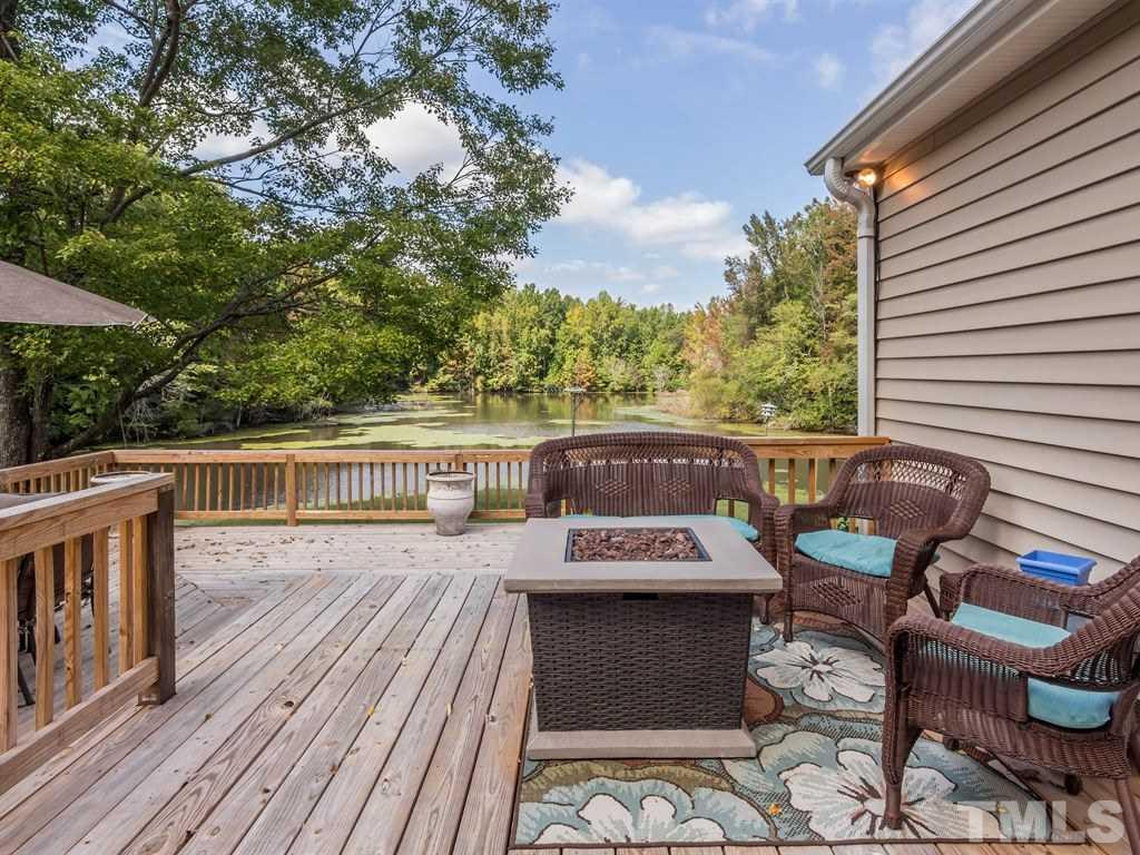 760 Southern High School Road Graham, NC 27253 - Photo 17 of 25 Deck overlooking 3+ acres