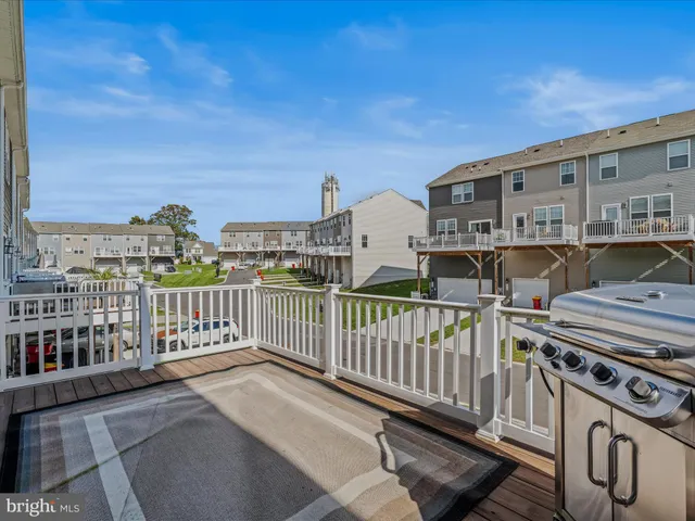 a view of a balcony with furniture