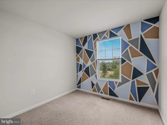 an ocean ceiling fan and stairs