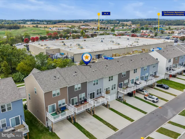 a view of city with ocean