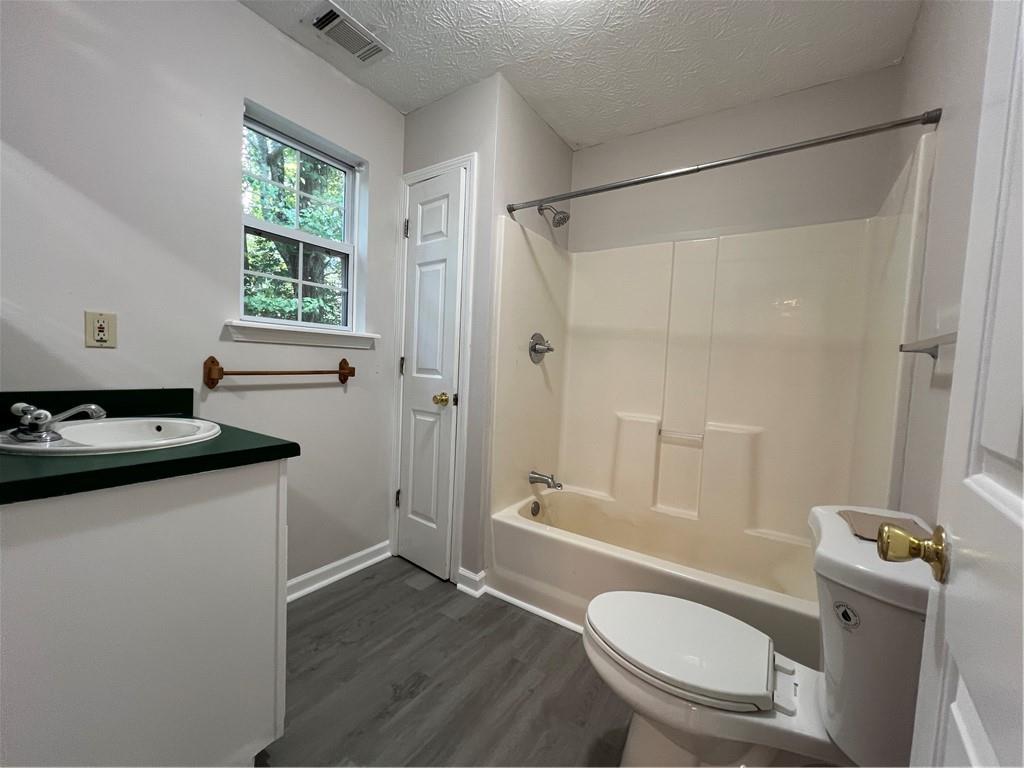 129 Pine Road Dahlonega, GA 30533 - Photo 20 of 27 a bathroom with a sink toilet and shower