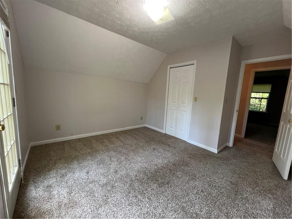 129 Pine Road Dahlonega, GA 30533 - Photo 22 of 27 an empty room with windows