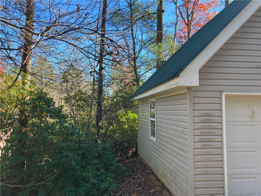 129 Pine Road Dahlonega, GA 30533 - Photo 7 of 27 a view of a small space in the backyard
