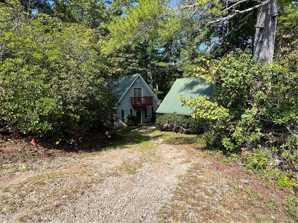 129 Pine Road Dahlonega, GA 30533 - Photo 8 of 27 a view of a house with a yard