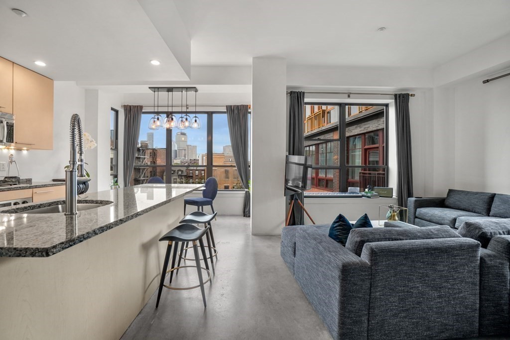 40 Fay Street, Unit 501 Boston, MA 02118 - Photo 5 of 10 a living room with furniture and large windows