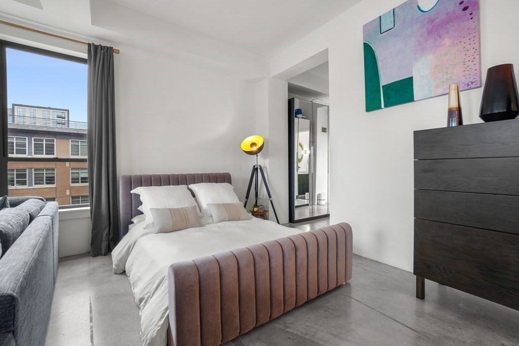 40 Fay Street, Unit 501 Boston, MA 02118 - Photo 6 of 10 a bedroom with a bed and walk in closet