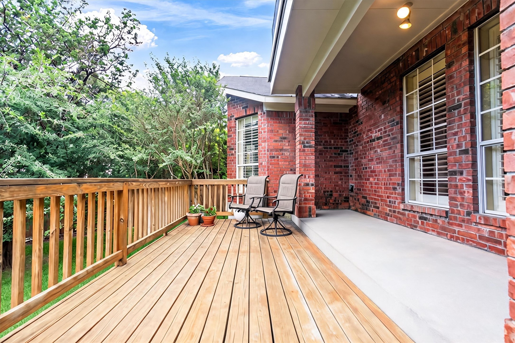6008 Tributary Ridge Court Austin, TX 78759 - Photo 29 of 36 A spacious wooden deck off kitchen/ dining providing an ideal outdoor relaxation space.