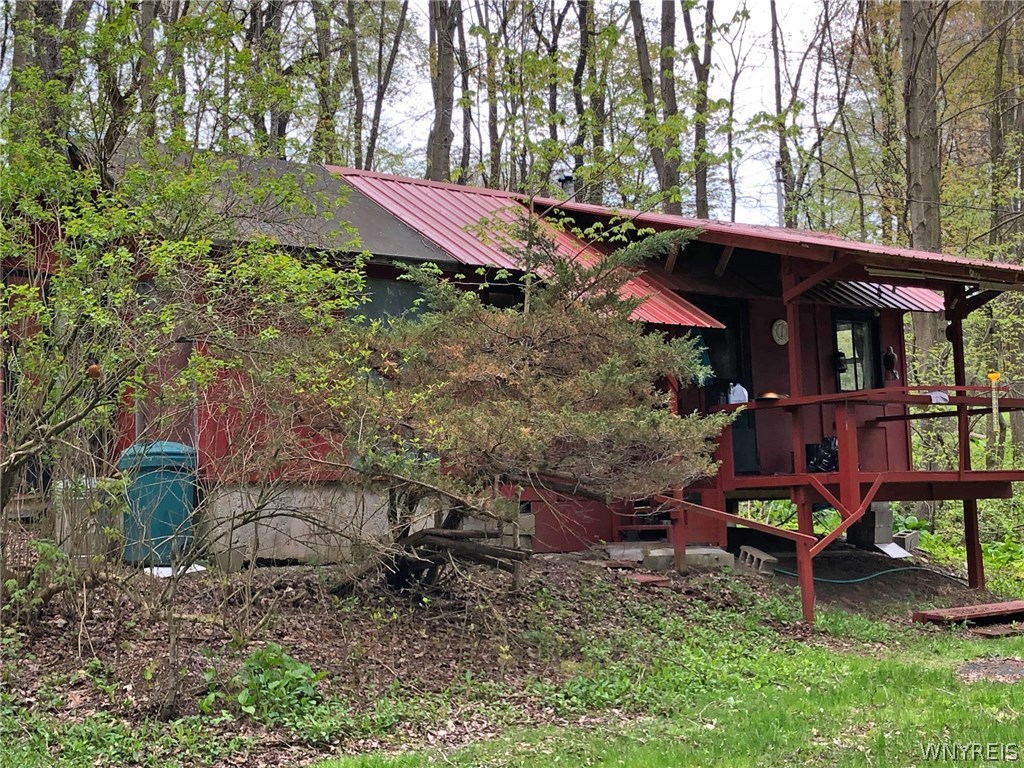 5829 East Koy Road Pike, NY 14536 - Photo 1 of 1 Main cabin with running water and kerosene stove f