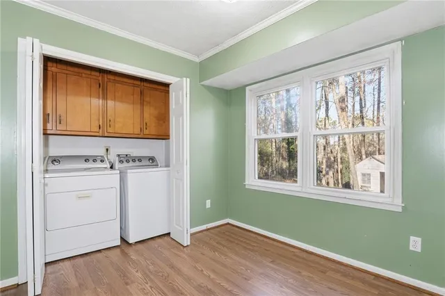 a view of room with window and washer