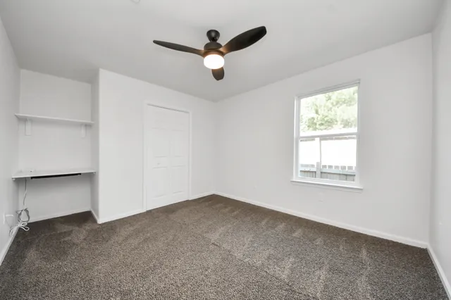 a large kitchen with cabinets